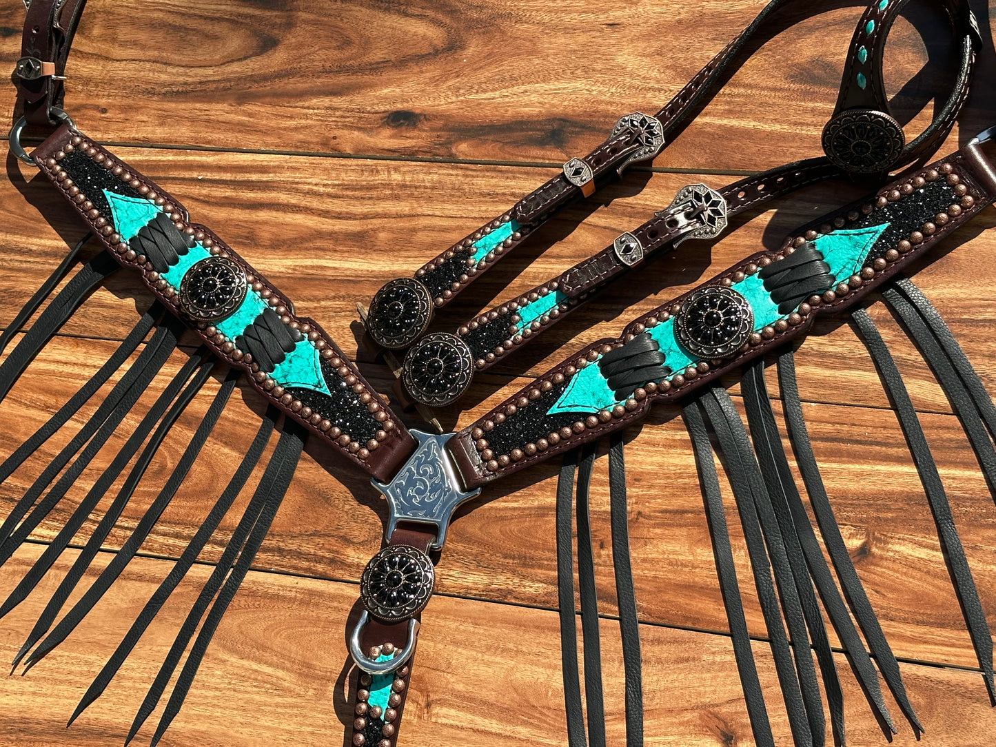 Turquoise with black chunky glitter and cross stitch