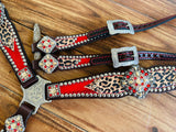 Tawny cheetah and red ice with double stacked silver conchos