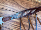Brown faded turquoise gator with feather