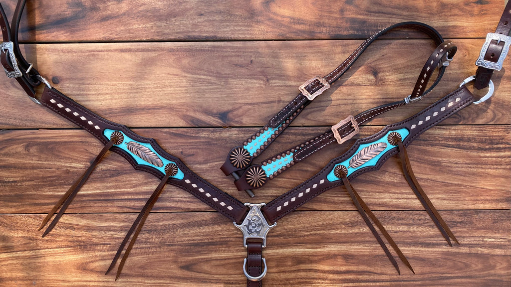 Turquoise with feather and pinwheel conchos