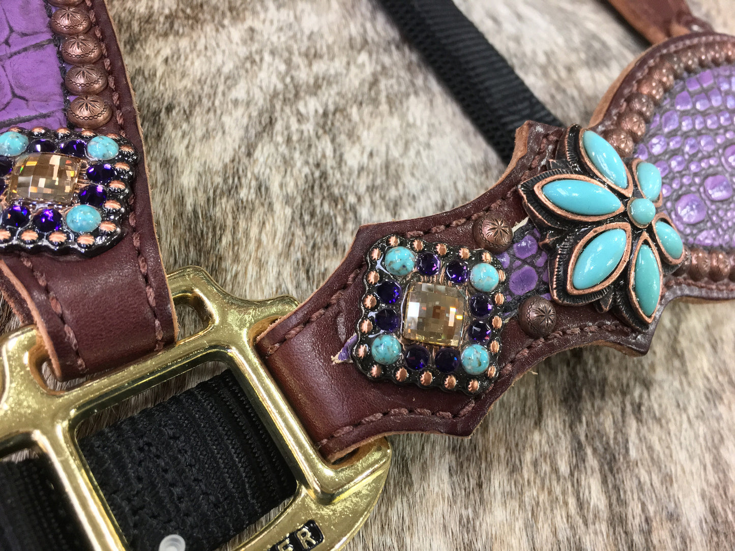 Purple gator halter with turquoise floral conchos.