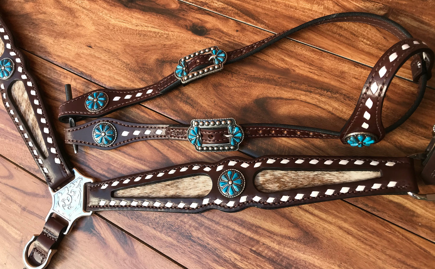 Buckstitch cowhide with turquoise flower