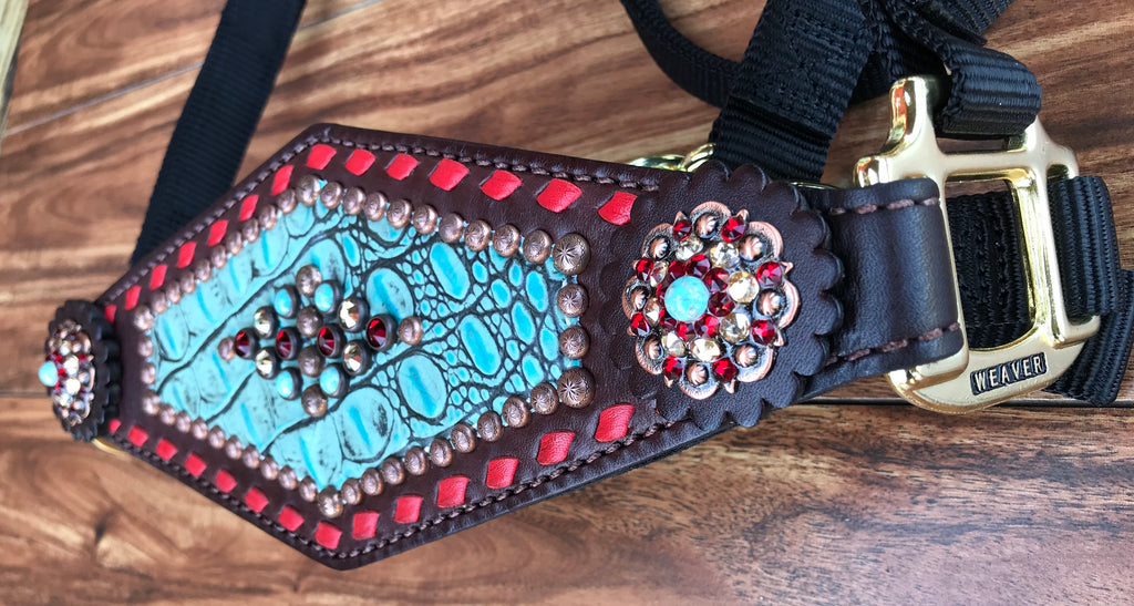 Turquoise gator with red buckstitch